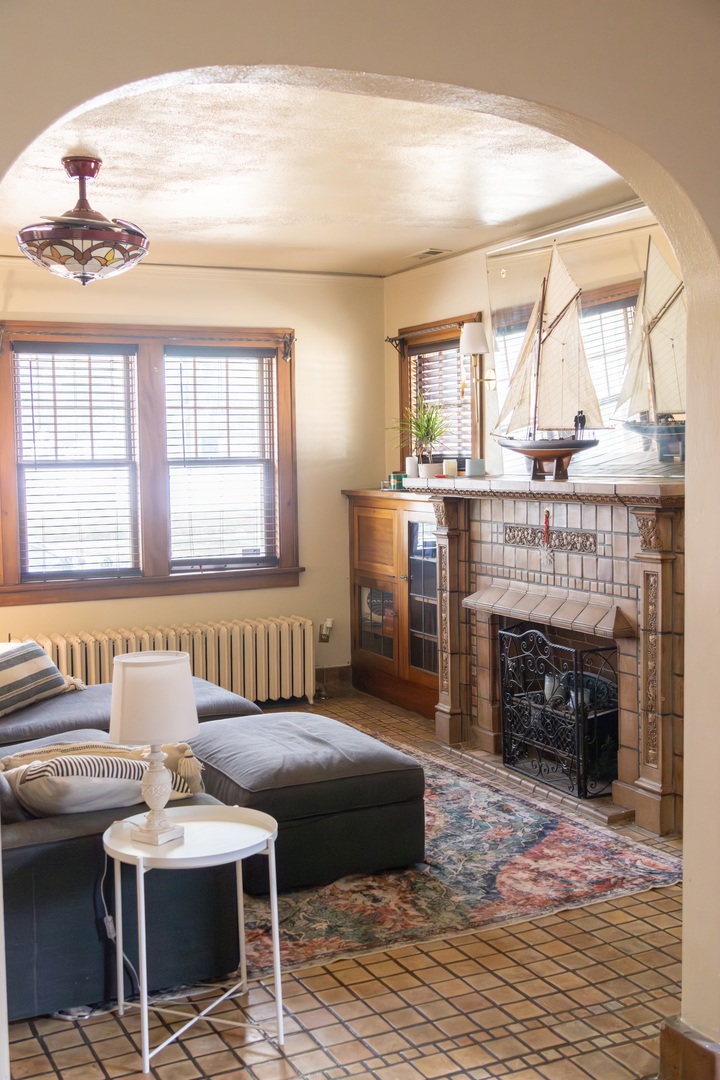 1619 Grant Avenue Rockford, IL 61103 - Photo 2 of 13 a living room with furniture and a fireplace