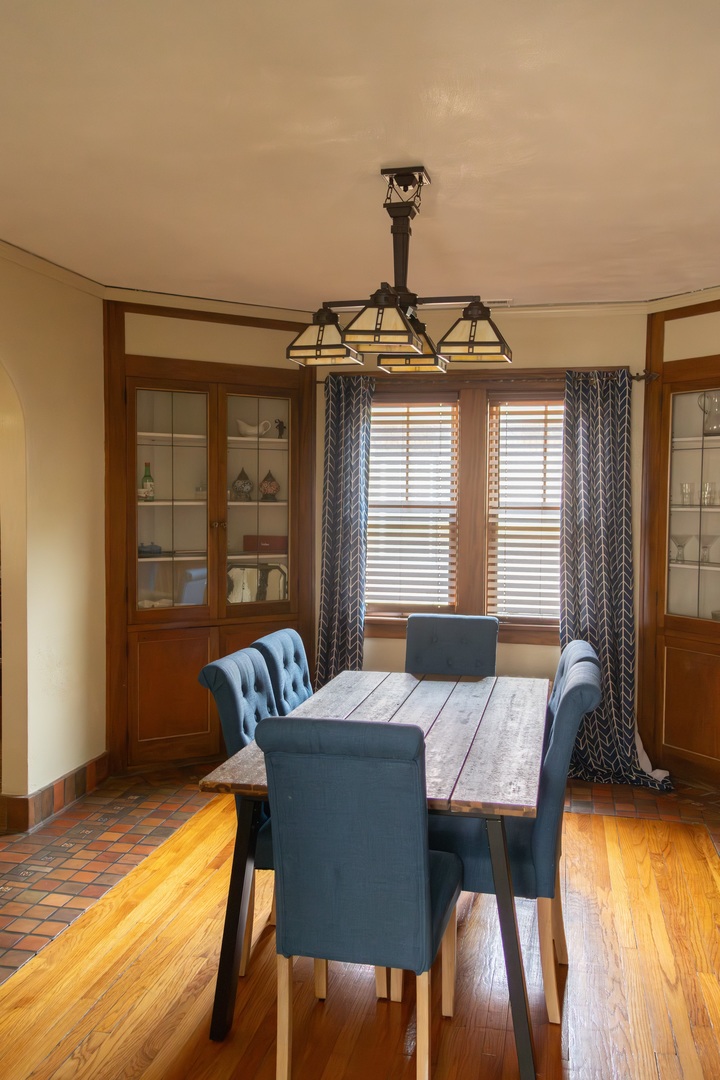 1619 Grant Avenue Rockford, IL 61103 - Photo 5 of 13 a view of a dining room with furniture and wooden floor