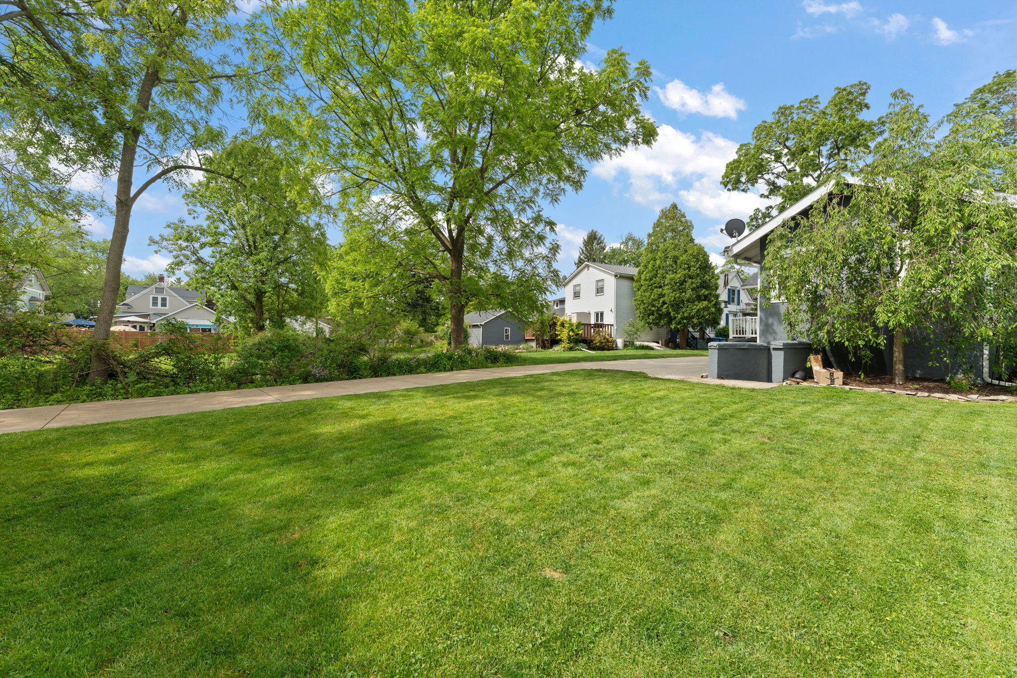 504 South Court Street Crown Point, IN 46307 - Photo 45 of 61 a view of outdoor space with deck and trees