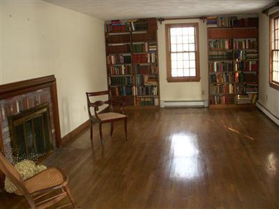13 Wellfield Road Forestdale, MA 02644 - Photo 6 of 14 a view of an empty room with wooden floor and a window