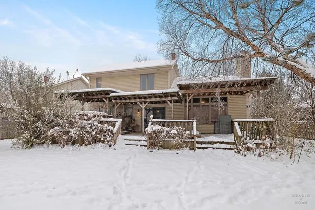 a view of a lake with couches and lake view