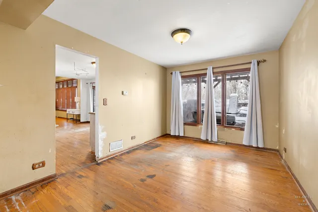 a view of a livingroom with wooden floor