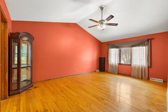 a bathroom with a sink double vanity and a toilet