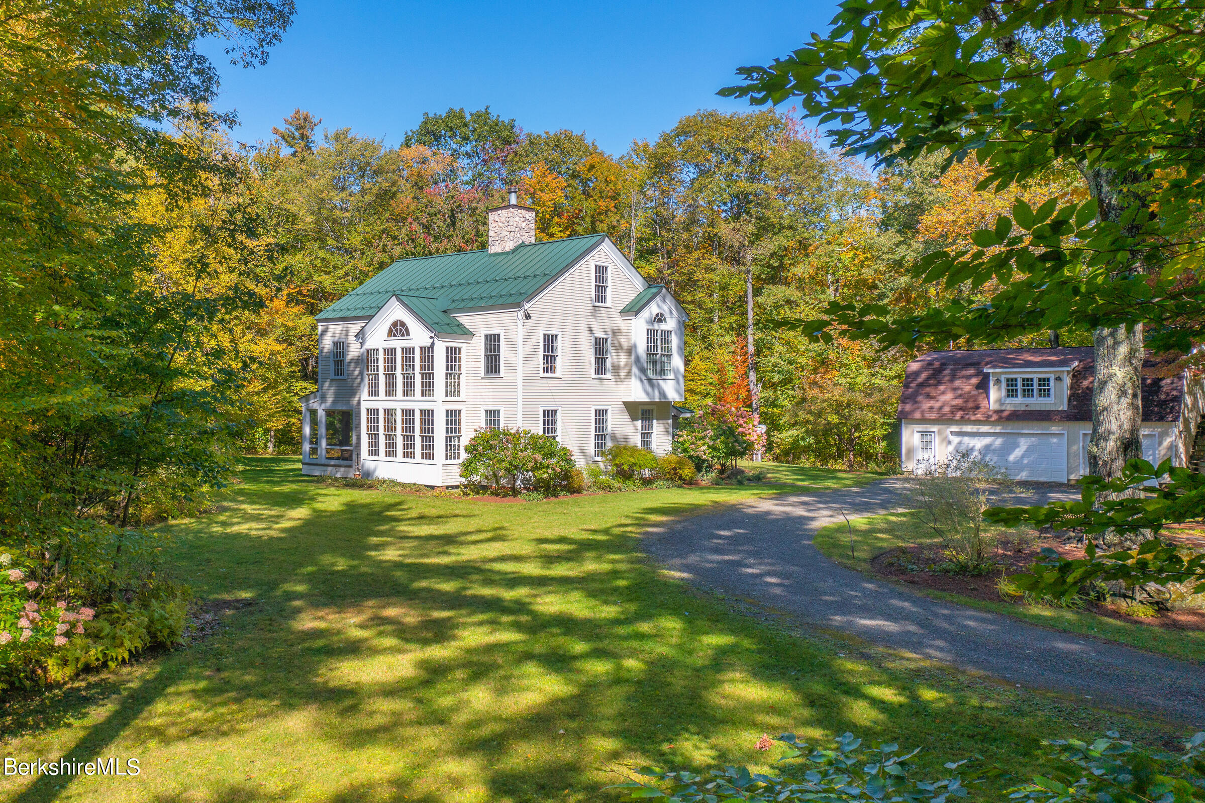 67 Fairview Road Monterey, MA 01245 - Photo 1 of 27 a front view of a house with a garden
