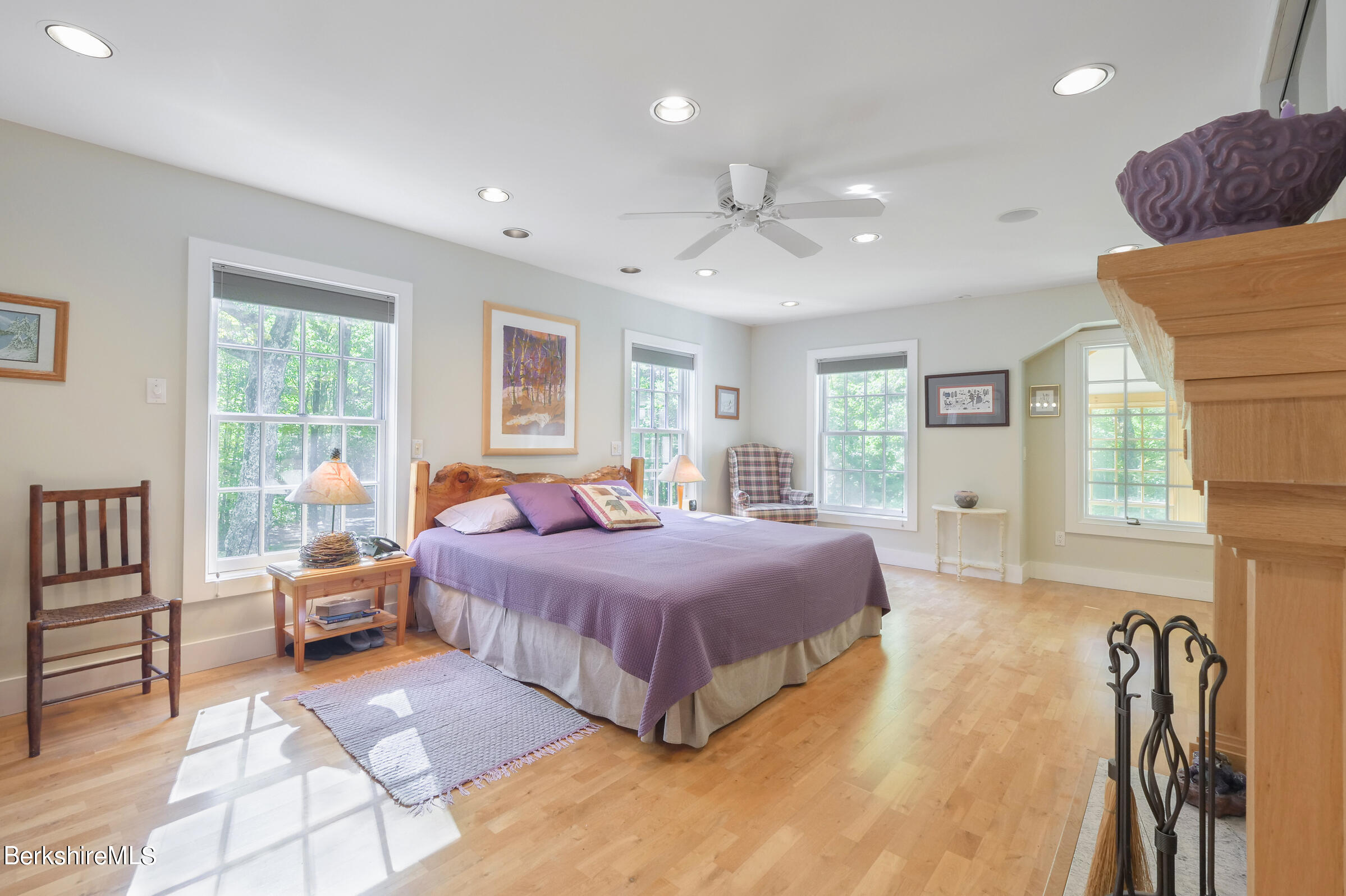 67 Fairview Road Monterey, MA 01245 - Photo 14 of 27 a spacious bedroom with a large bed and a window