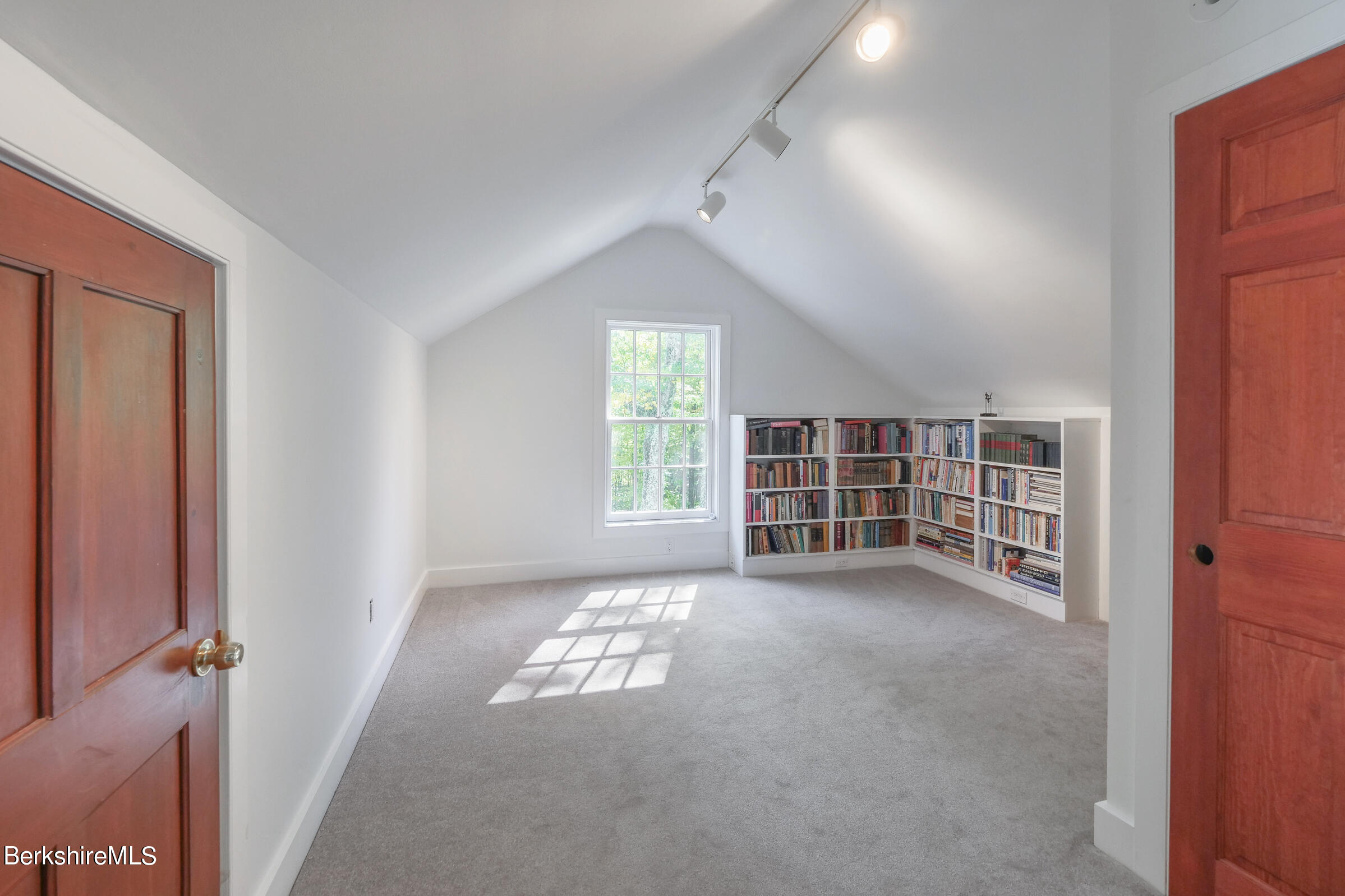 67 Fairview Road Monterey, MA 01245 - Photo 20 of 27 an empty room with windows