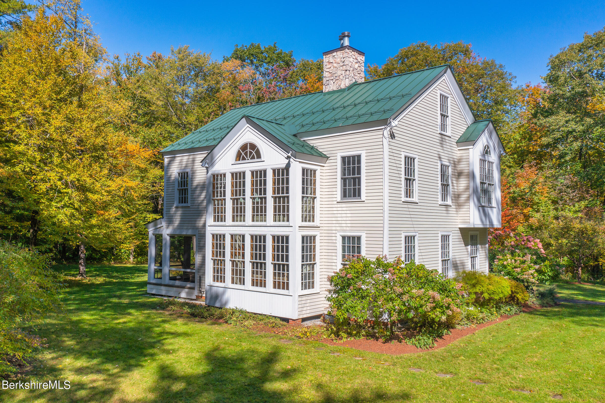 67 Fairview Road Monterey, MA 01245 - Photo 2 of 27 front view of a house with a yard