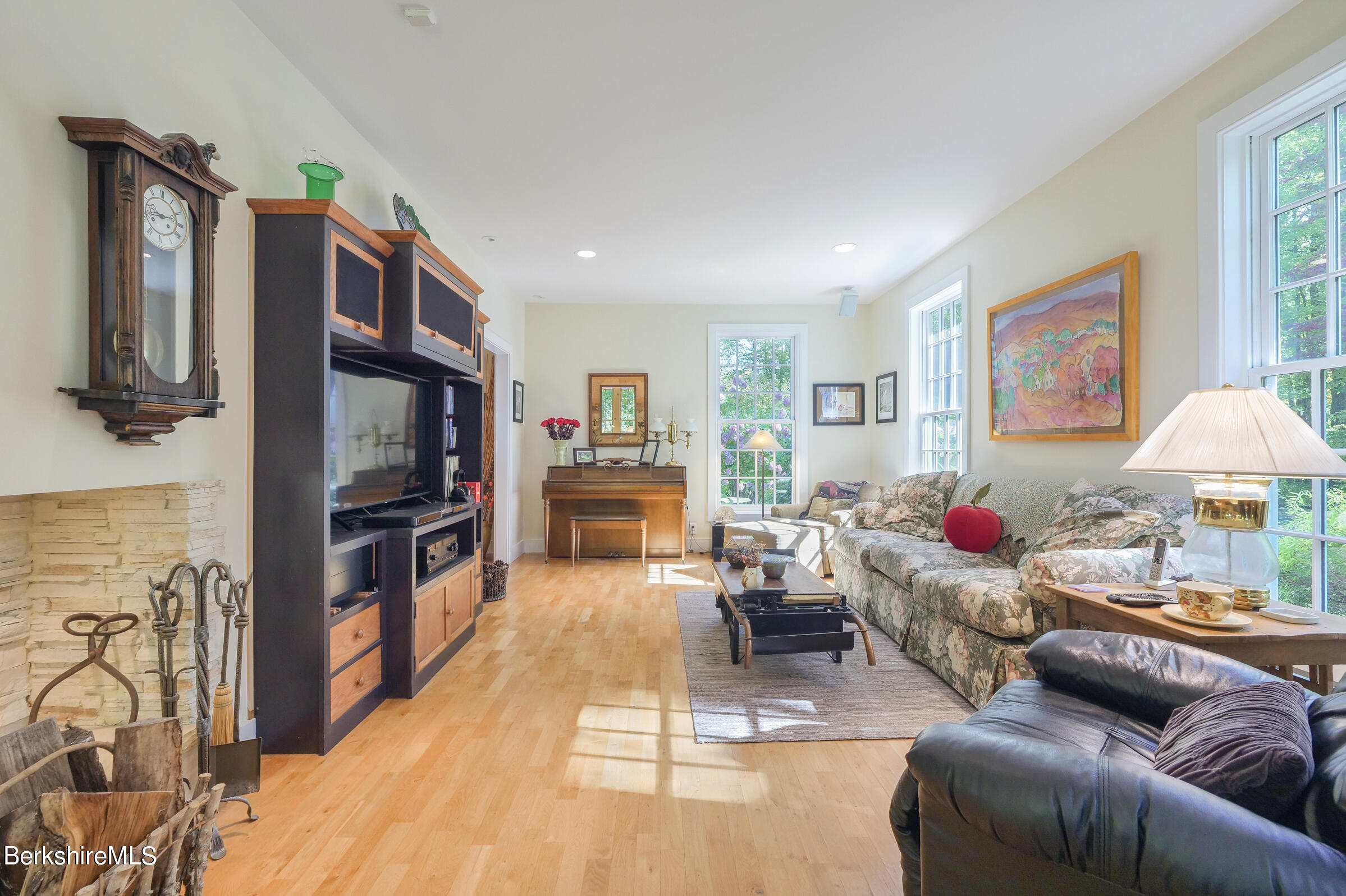 67 Fairview Road Monterey, MA 01245 - Photo 8 of 27 a living room with furniture and a flat screen tv