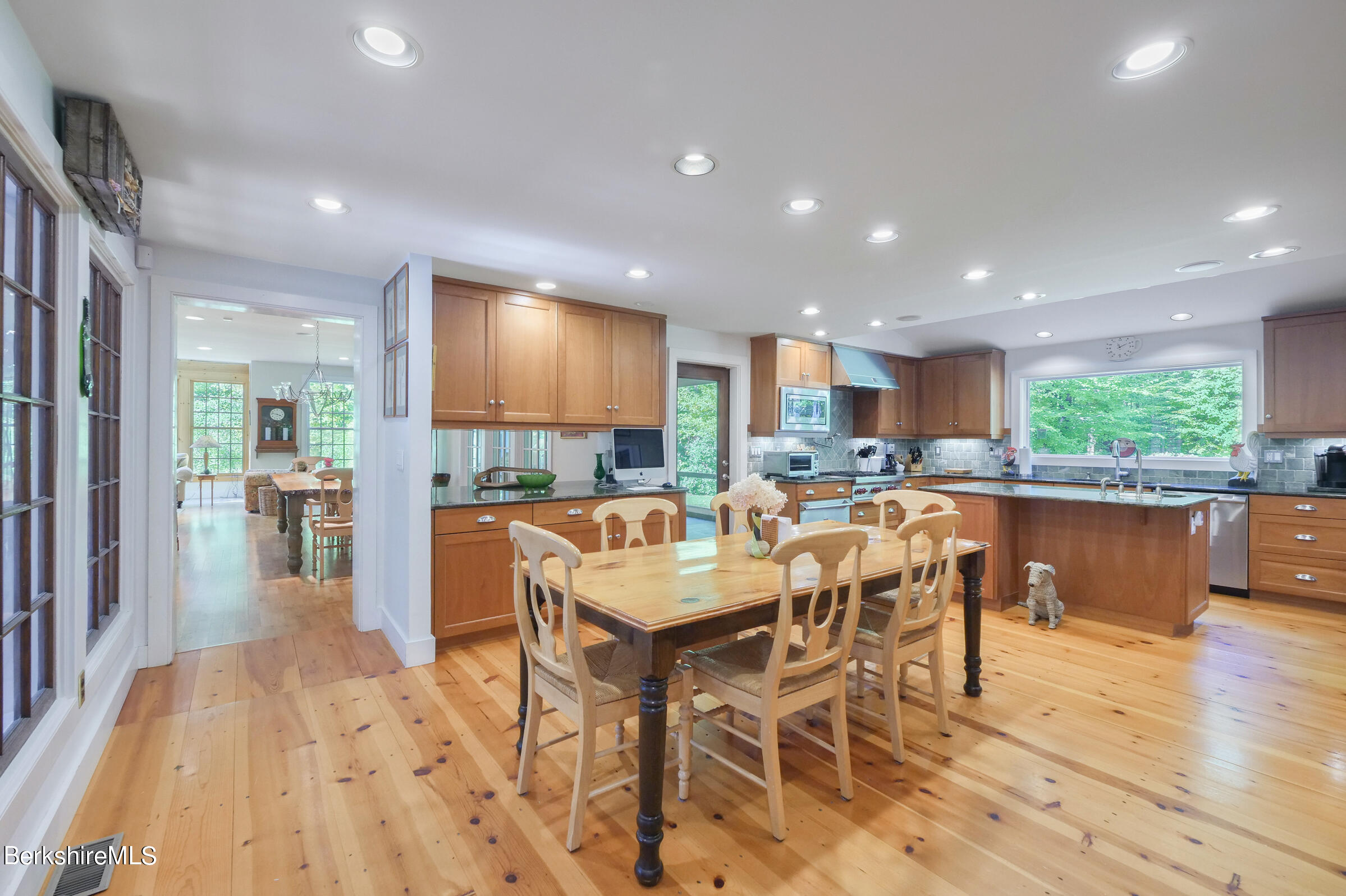67 Fairview Road Monterey, MA 01245 - Photo 10 of 27 a view of a dining room with furniture