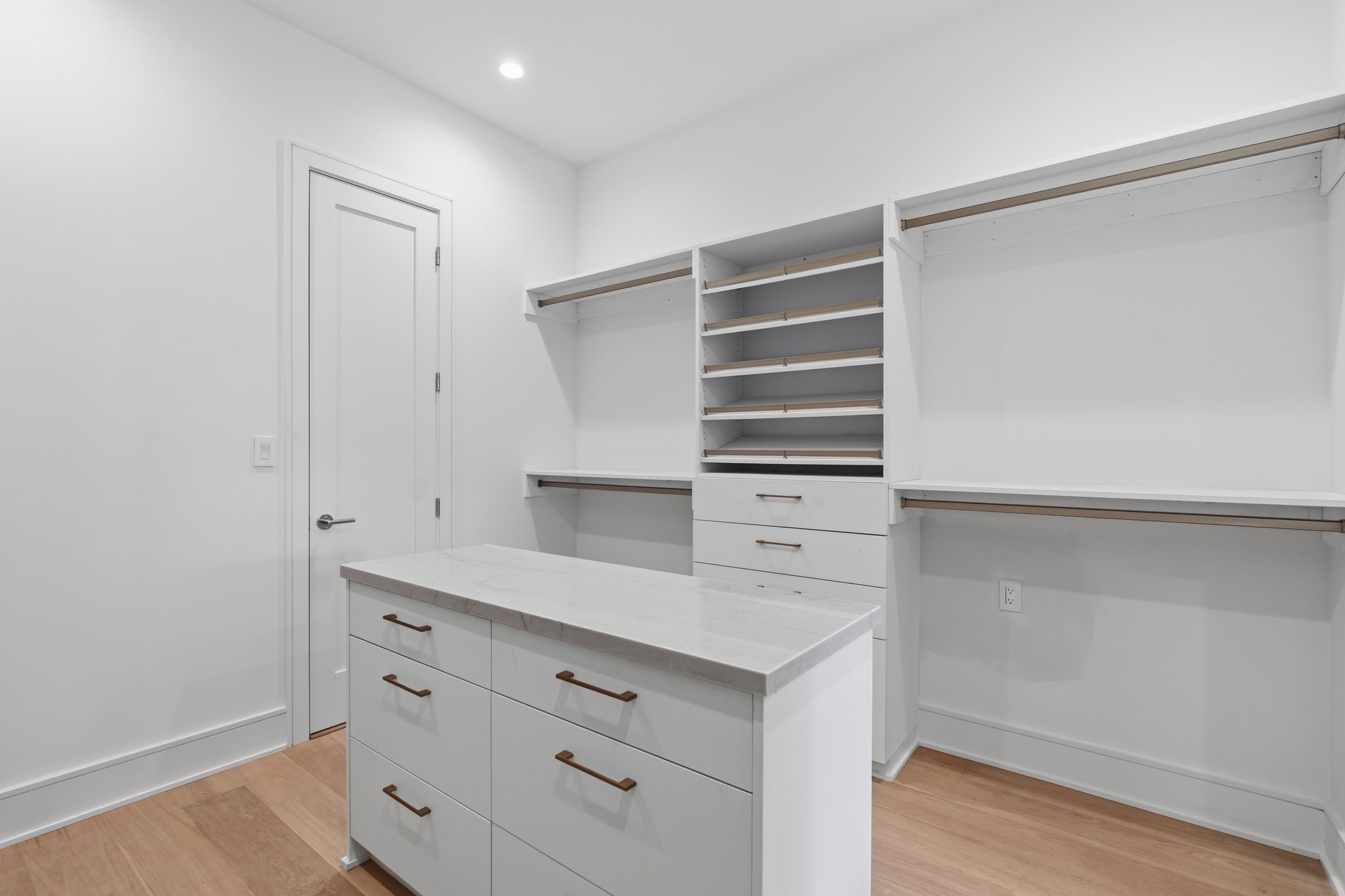 820 Malone Street Houston, TX 77007 - Photo 18 of 31 a view of walk in closet with empty racks