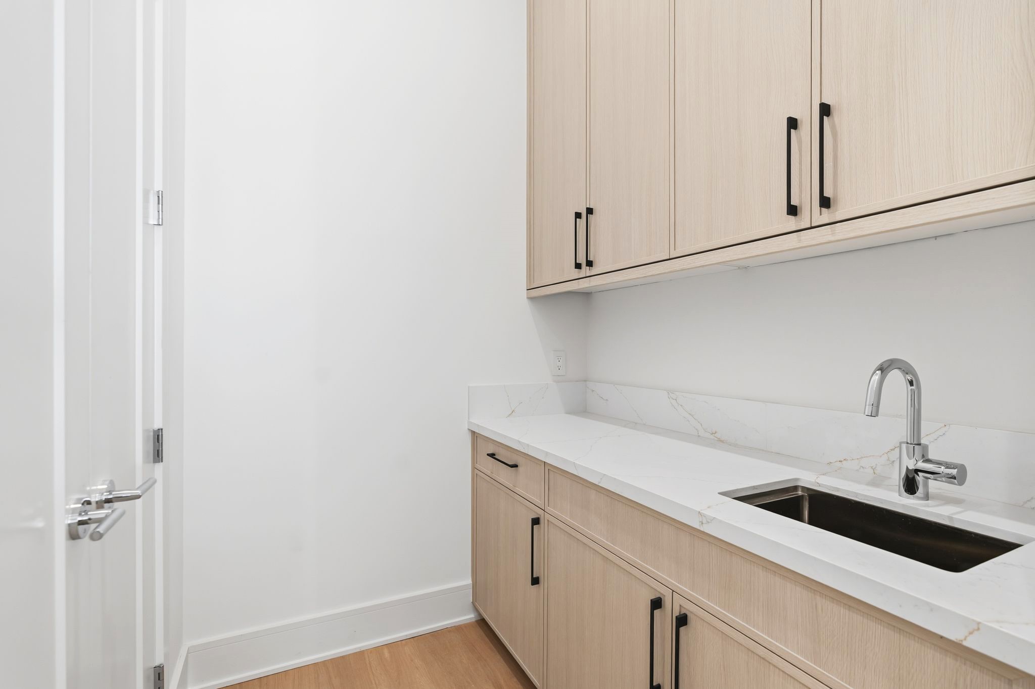 820 Malone Street Houston, TX 77007 - Photo 7 of 31 a view of a kitchen with white cabinets