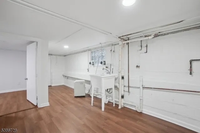 a view of deck with wooden floor and outdoor seating