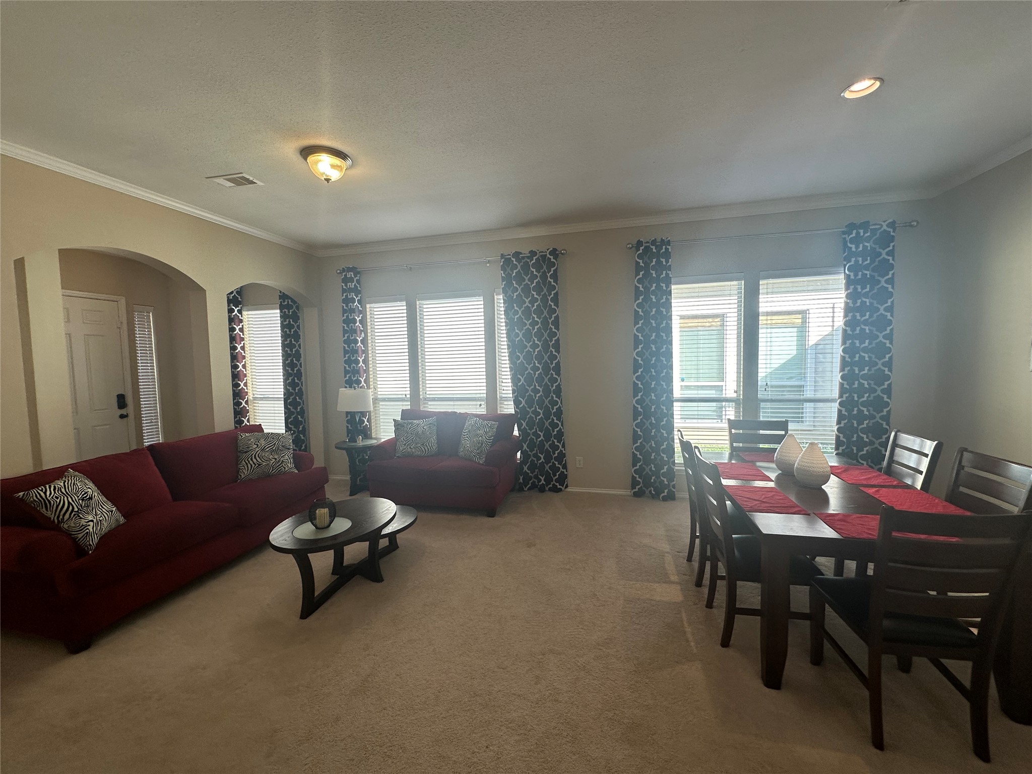 14943 Atmore Pl Drive Houston, TX 77082 - Photo 2 of 10 a living room with furniture and a large window