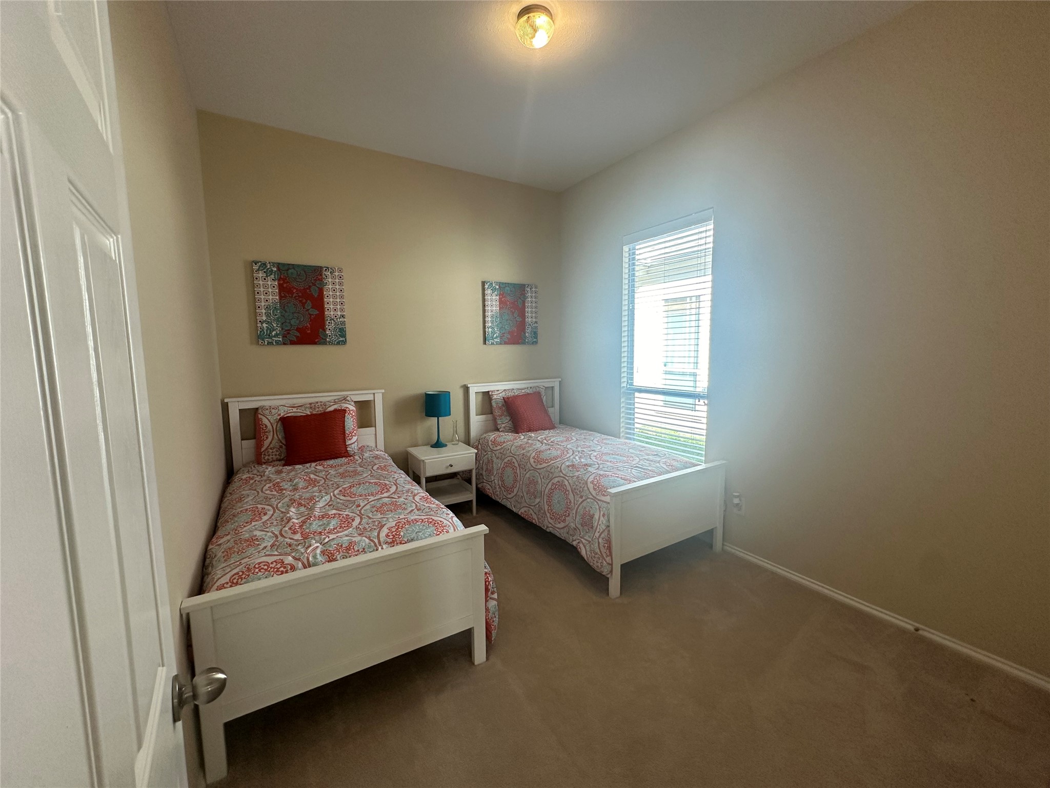 14943 Atmore Pl Drive Houston, TX 77082 - Photo 8 of 10 a bedroom with a bed and a window