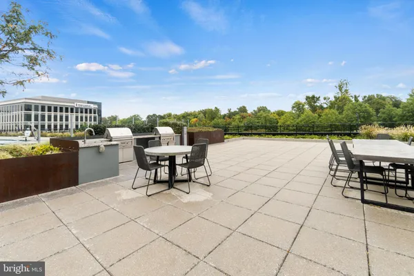 a view of a terrace with chairs