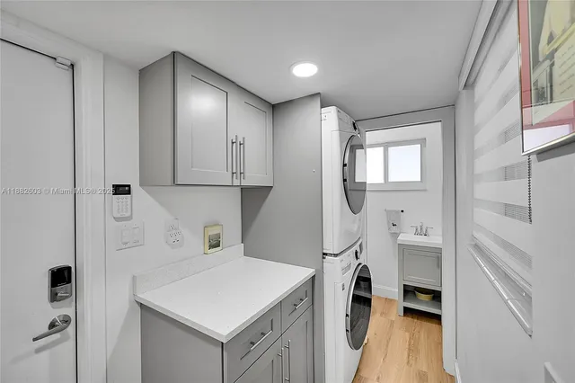 a hallway with washer and dryer