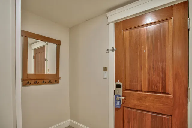 a bathroom with a shower and a sink