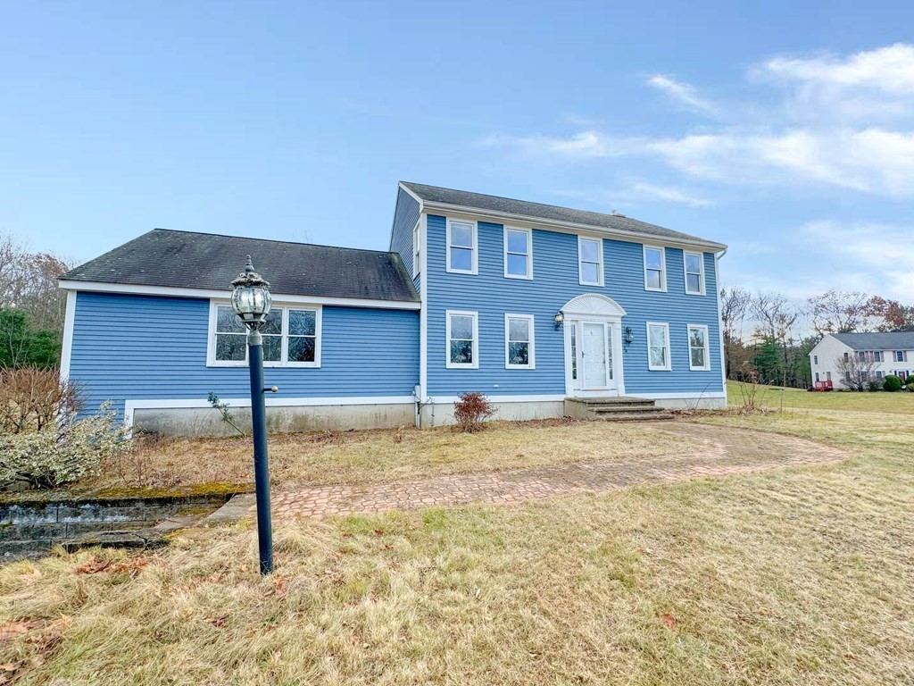 29 Thurston Hill Road Rutland, MA 01543 - Photo 4 of 38 a front view of a house with a yard