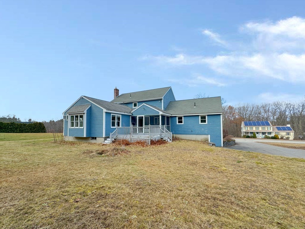 29 Thurston Hill Road Rutland, MA 01543 - Photo 8 of 38 a front view of a house with a yard