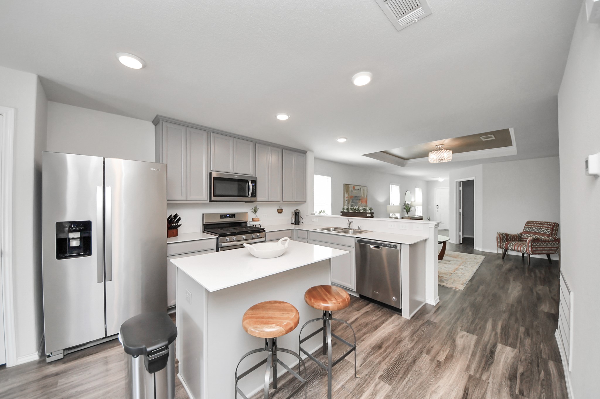 5722 Savanna Pasture Road Katy, TX 77493 - Photo 14 of 40 Perfect for morning coffee or evening appetizers. This island is the ultimate gathering spot for family and friends