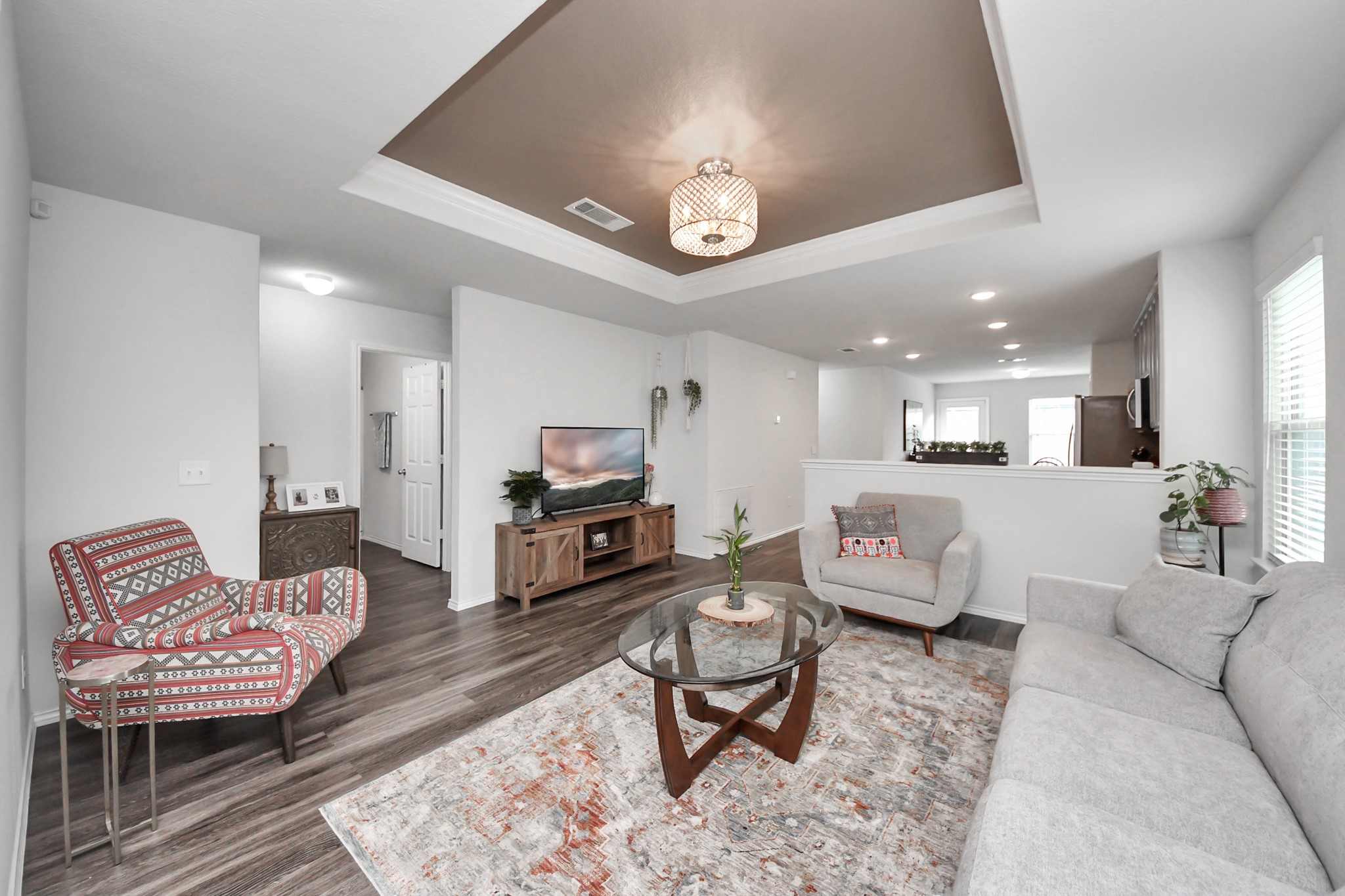 5722 Savanna Pasture Road Katy, TX 77493 - Photo 8 of 40 Spacious and bright! The open-concept layout ensures you're never far from the conversation while relaxing in the heart of the home