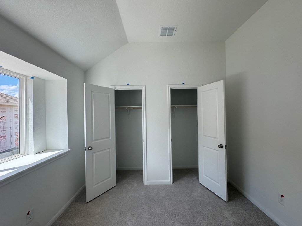 3729 Pin Oak Hills Seguin, TX 78155 - Photo 12 of 19 an empty room with windows and closet