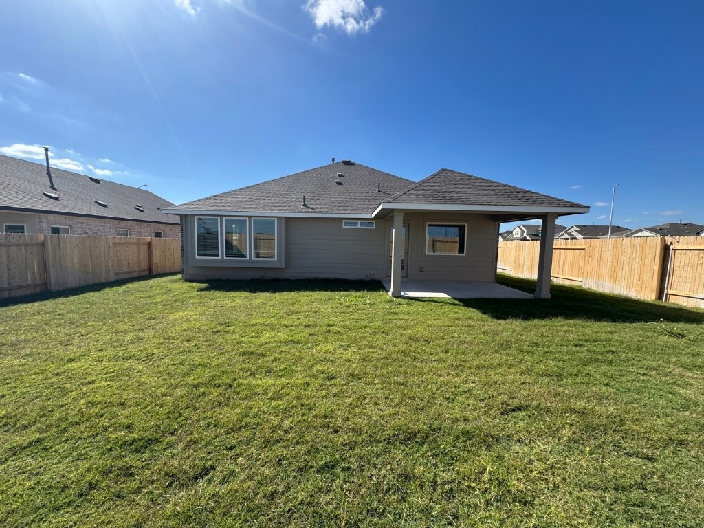 3729 Pin Oak Hills Seguin, TX 78155 - Photo 16 of 19 a front view of a house with a garden