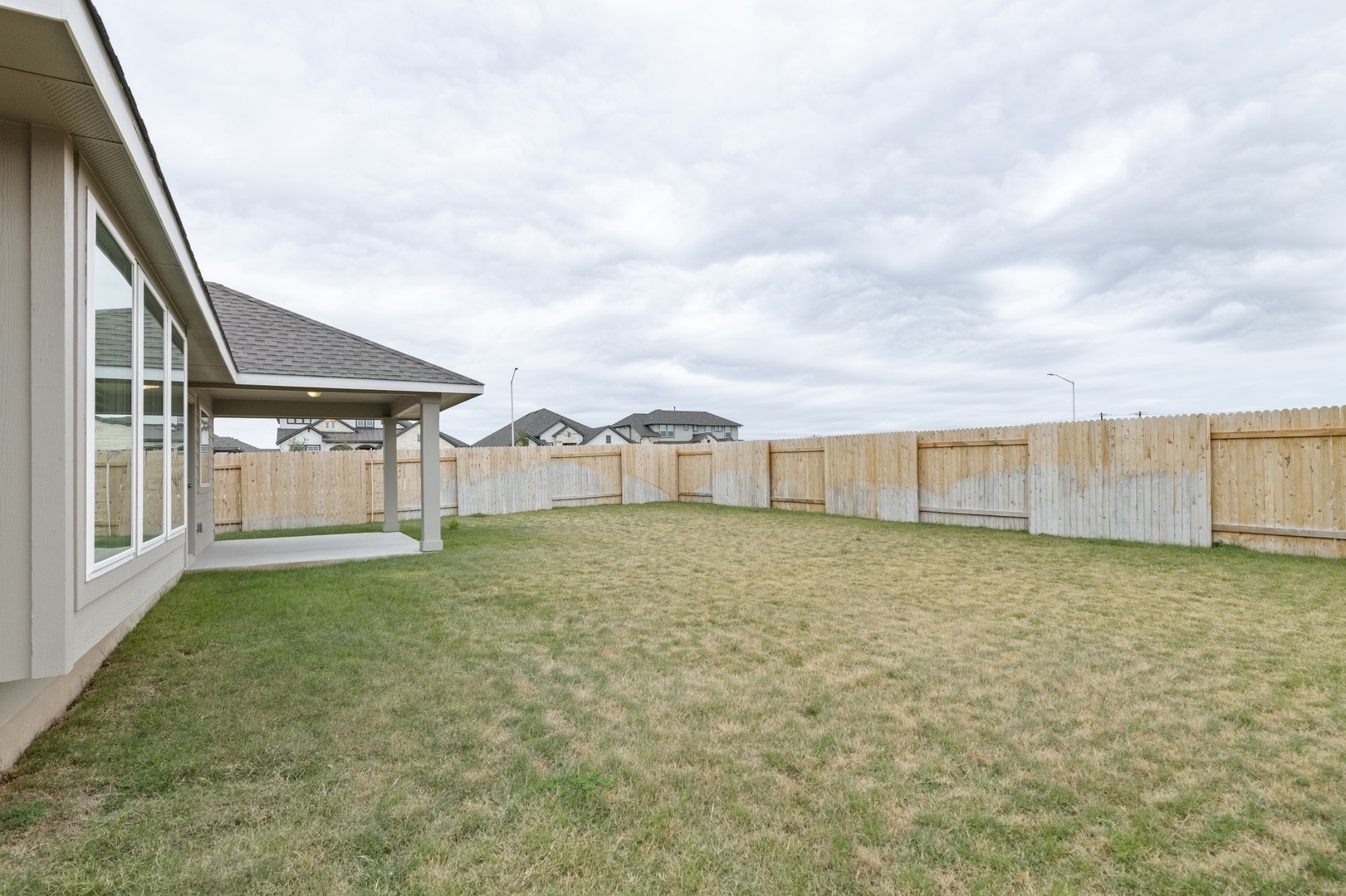 3729 Pin Oak Hills Seguin, TX 78155 - Photo 21 of 22 Fenced backyard featuring a patio