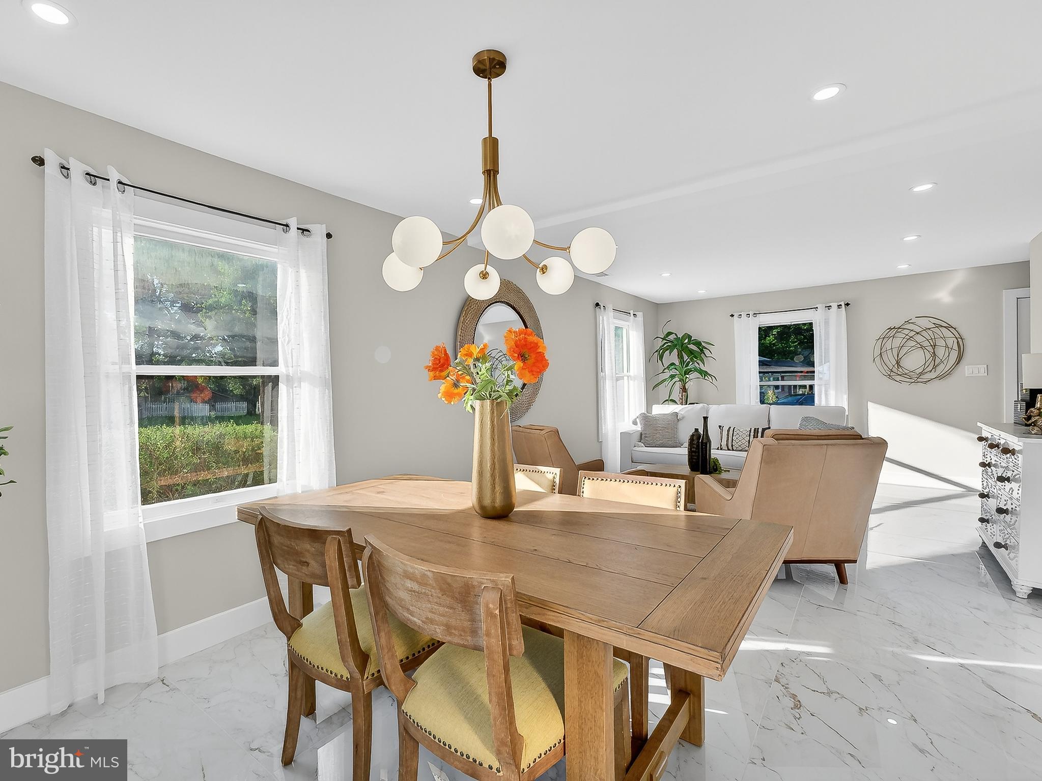 16 Estate Road Pemberton, NJ 08068 - Photo 11 of 40 a dining room filled chandelier and wooden floor
