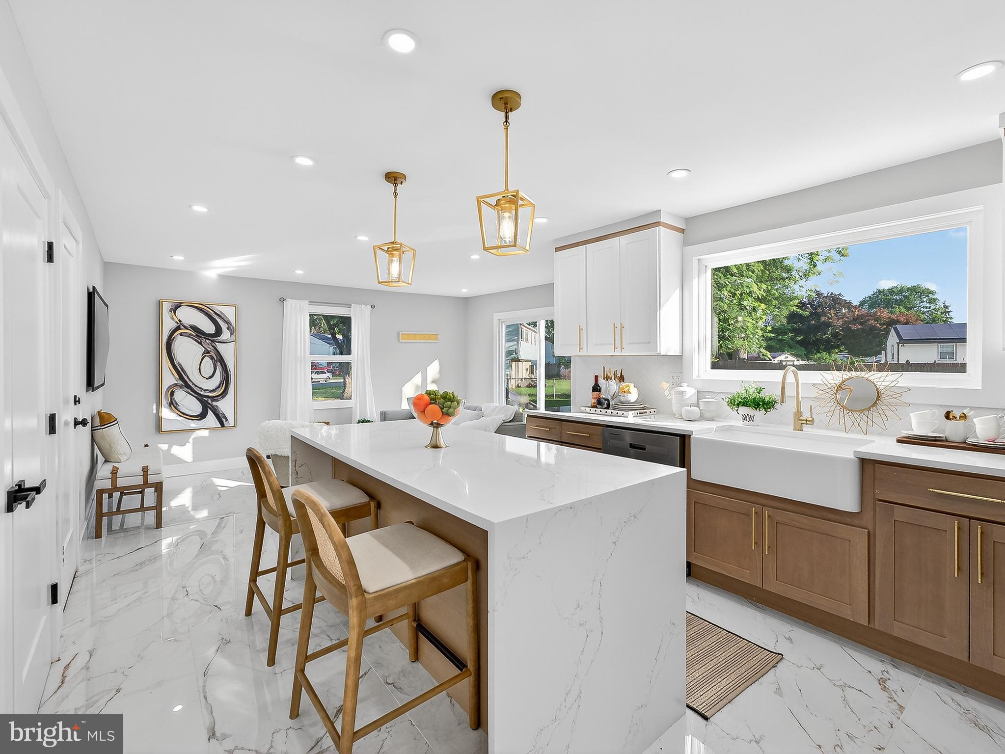 16 Estate Road Pemberton, NJ 08068 - Photo 12 of 40 a kitchen with a table chairs sink and cabinets