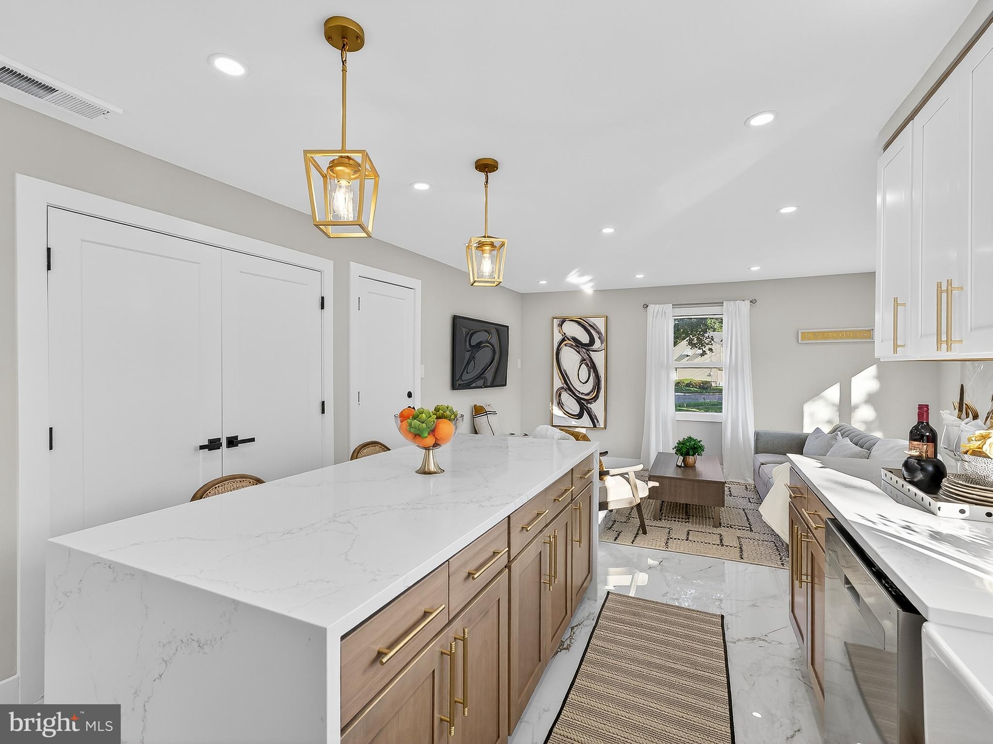 16 Estate Road Pemberton, NJ 08068 - Photo 14 of 40 a kitchen that has a lot of cabinets a sink and wooden floor