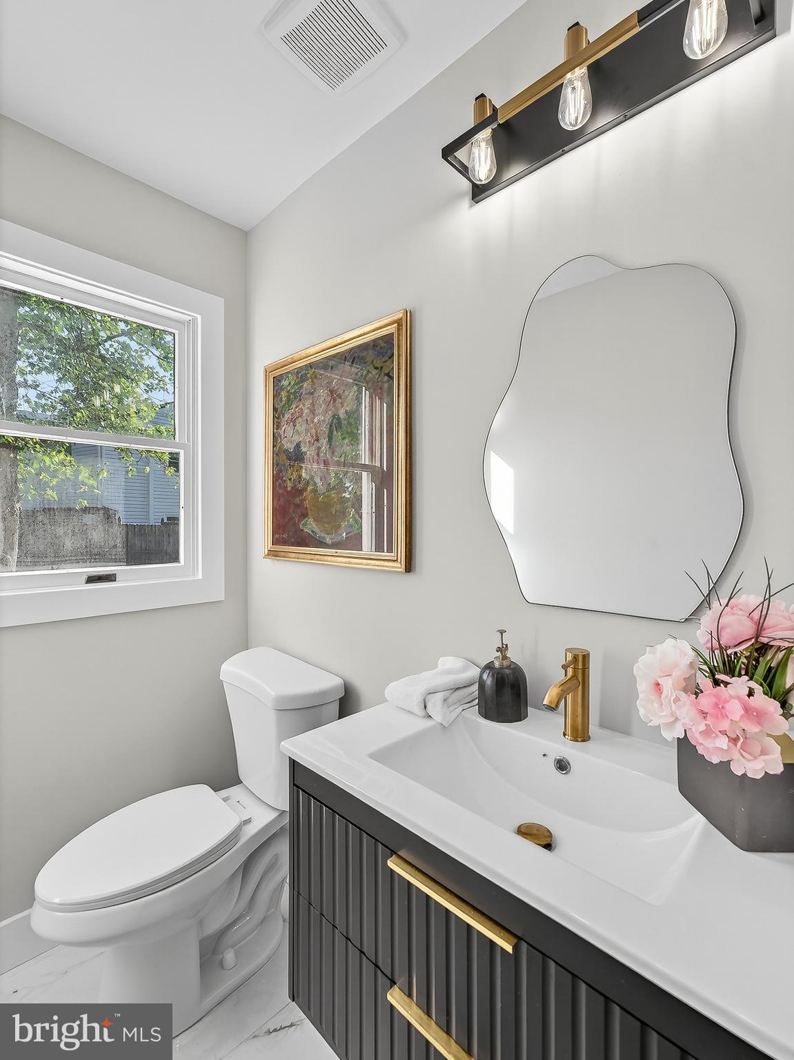 16 Estate Road Pemberton, NJ 08068 - Photo 20 of 40 a bathroom with a sink and a mirror