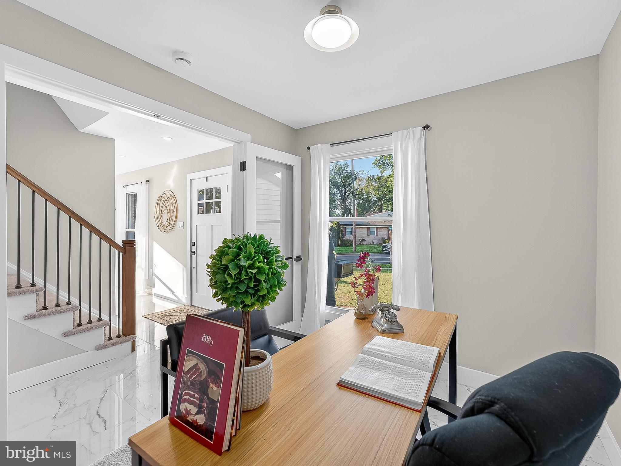 16 Estate Road Pemberton, NJ 08068 - Photo 22 of 40 a living room with furniture and a potted plant