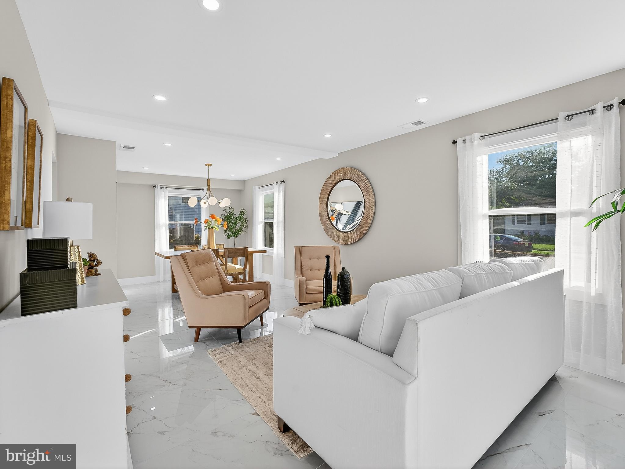16 Estate Road Pemberton, NJ 08068 - Photo 7 of 40 a living room with furniture and a large window
