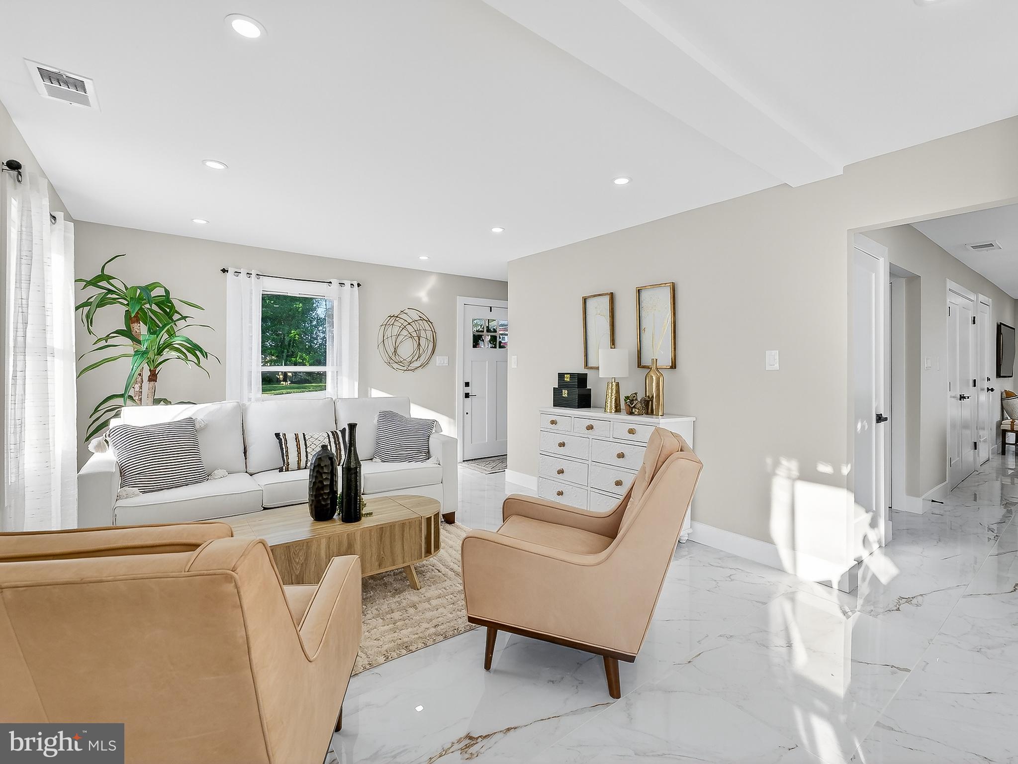 16 Estate Road Pemberton, NJ 08068 - Photo 9 of 40 a living room with furniture and a large window