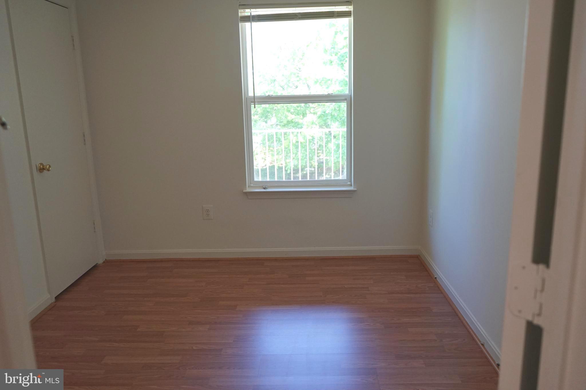 14101 Valleyfield Drive, Unit 74 Silver Spring, MD 20906 - Photo 22 of 28 2nd bedroom with large window