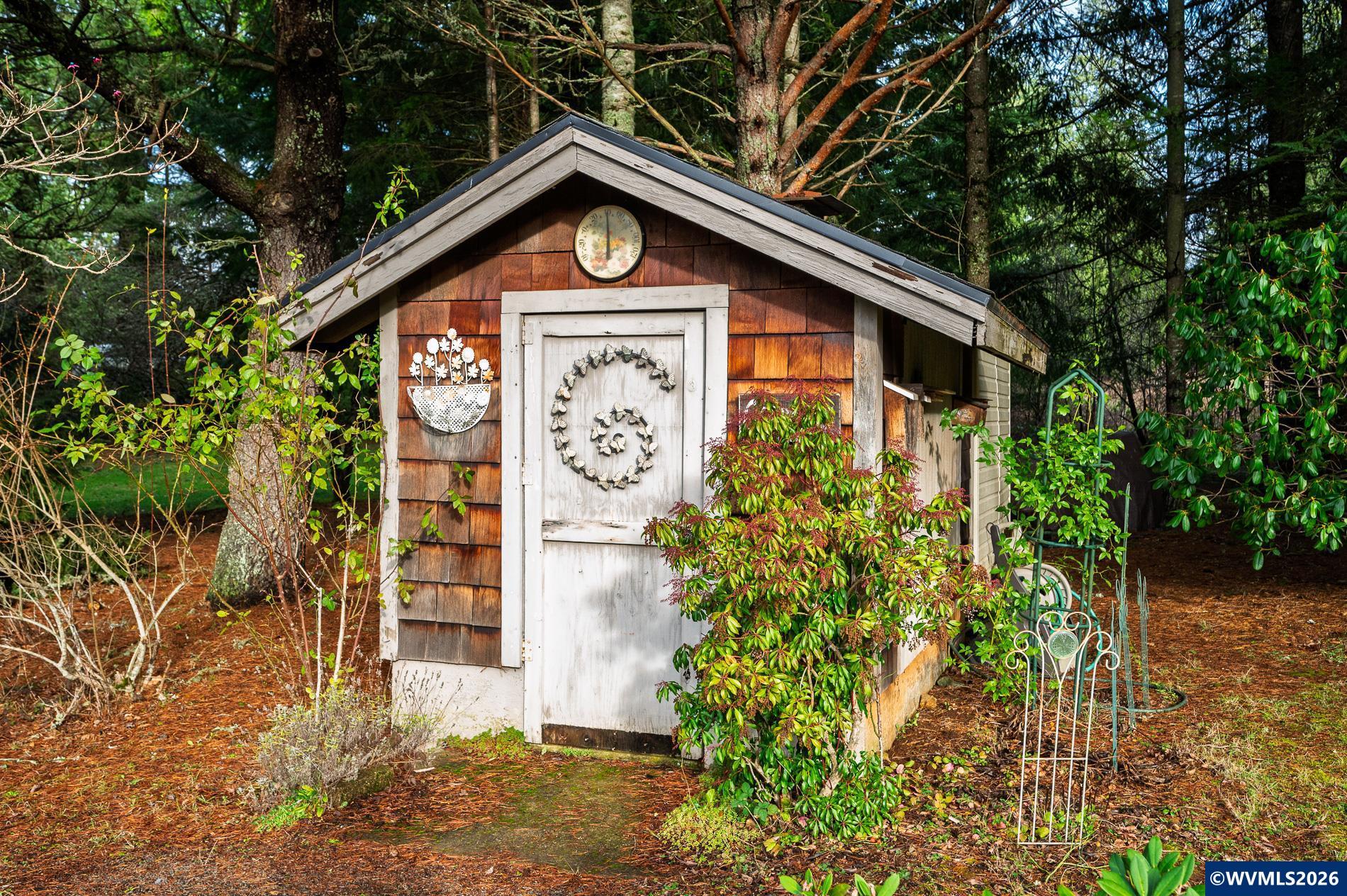 27572 South Kinzy Road Estacada, OR 97023 - Photo 5 of 50 a view of a house with a yard potted plants