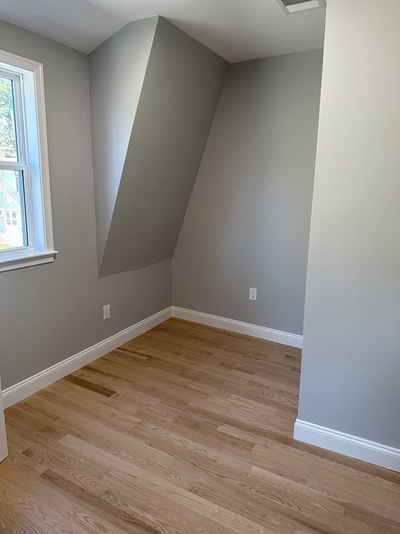 102 Beaconsfield Road Worcester, MA 01602 - Photo 23 of 34 a view of empty room with wooden floor