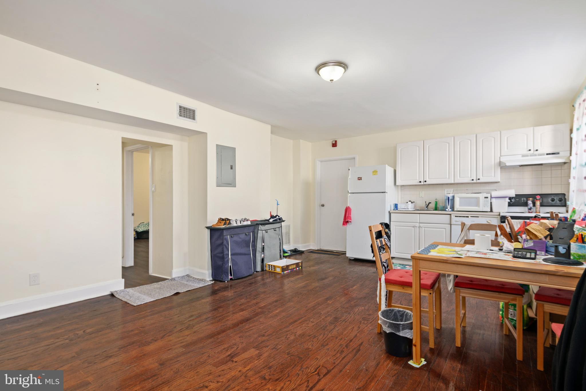 252 South Street, Unit 2 Philadelphia, PA 19147 - Photo 2 of 15 a view of kitchen with cabinets and wooden floor