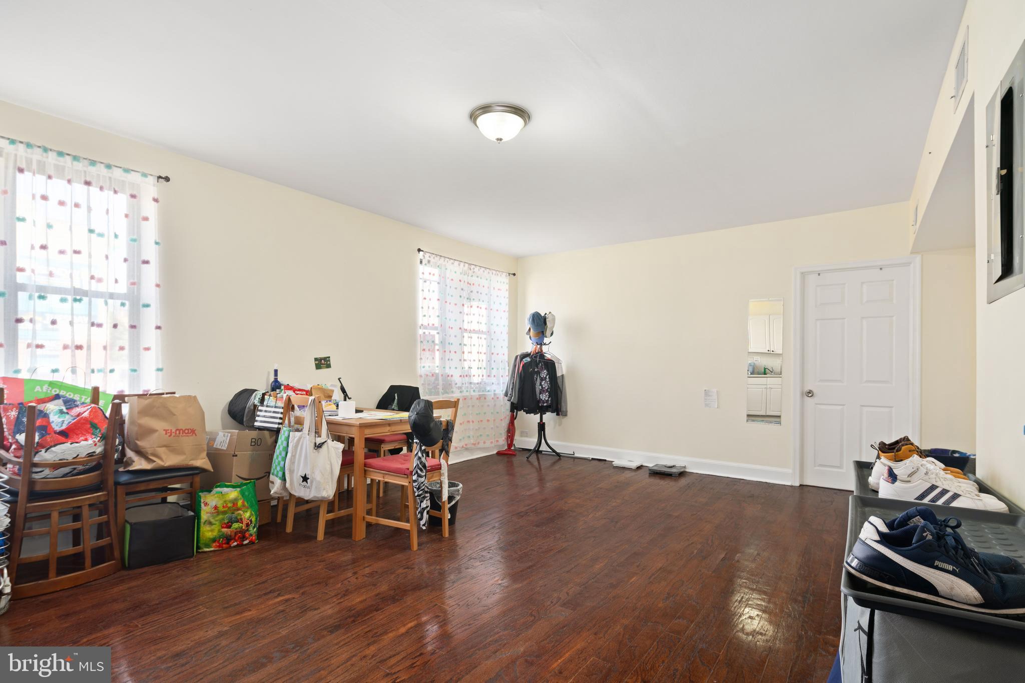 252 South Street, Unit 2 Philadelphia, PA 19147 - Photo 3 of 15 a living room with furniture and wooden floor