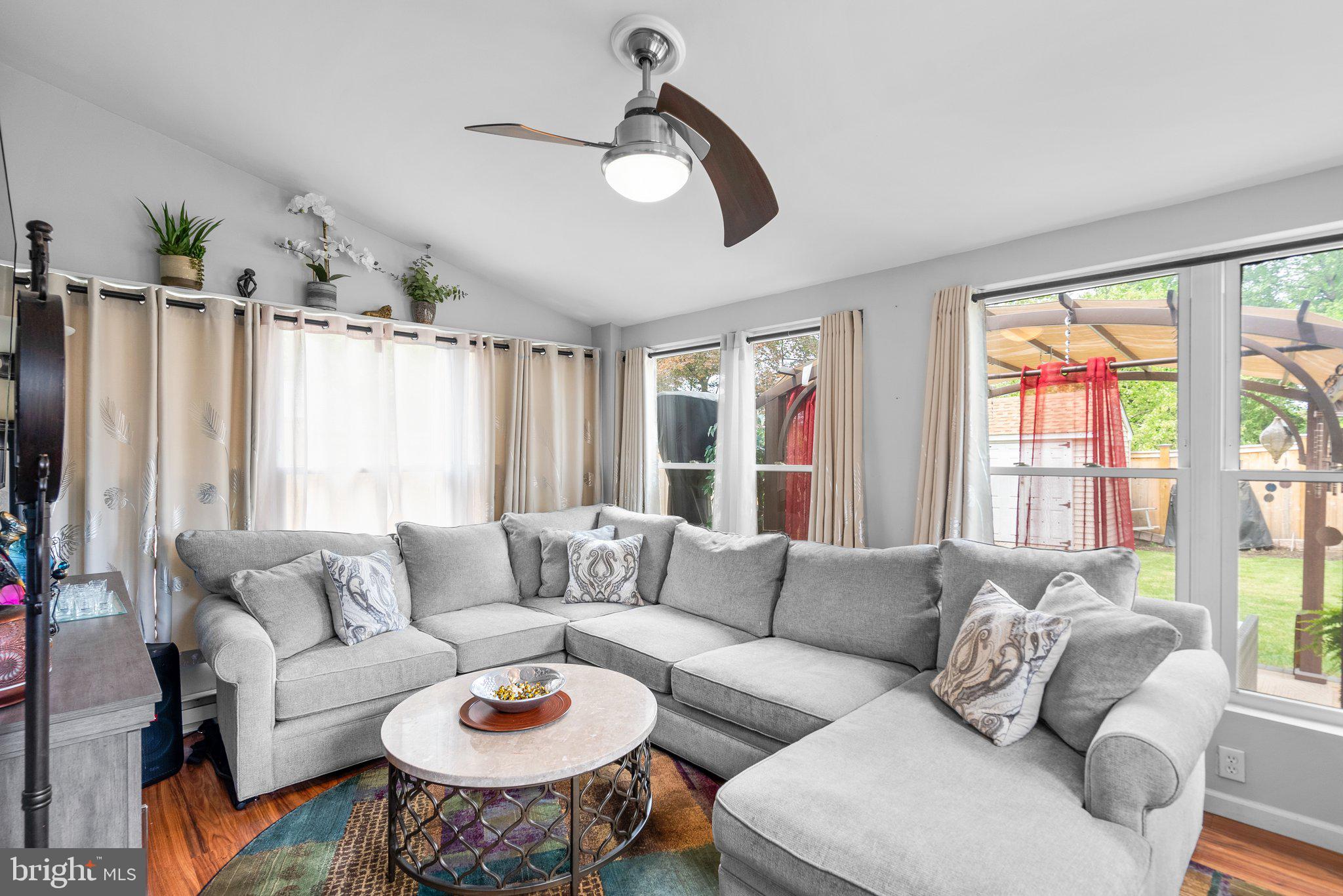 1013 Carson Street Silver Spring, MD 20901 - Photo 11 of 20 a living room with furniture and a large window