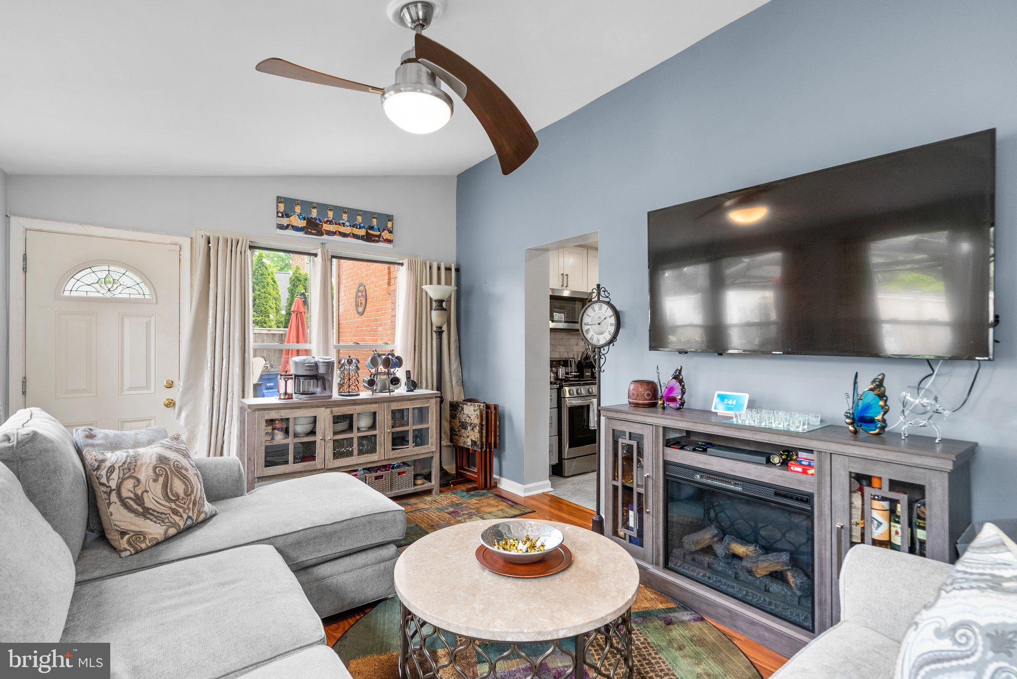 1013 Carson Street Silver Spring, MD 20901 - Photo 12 of 20 a living room with furniture and a fireplace