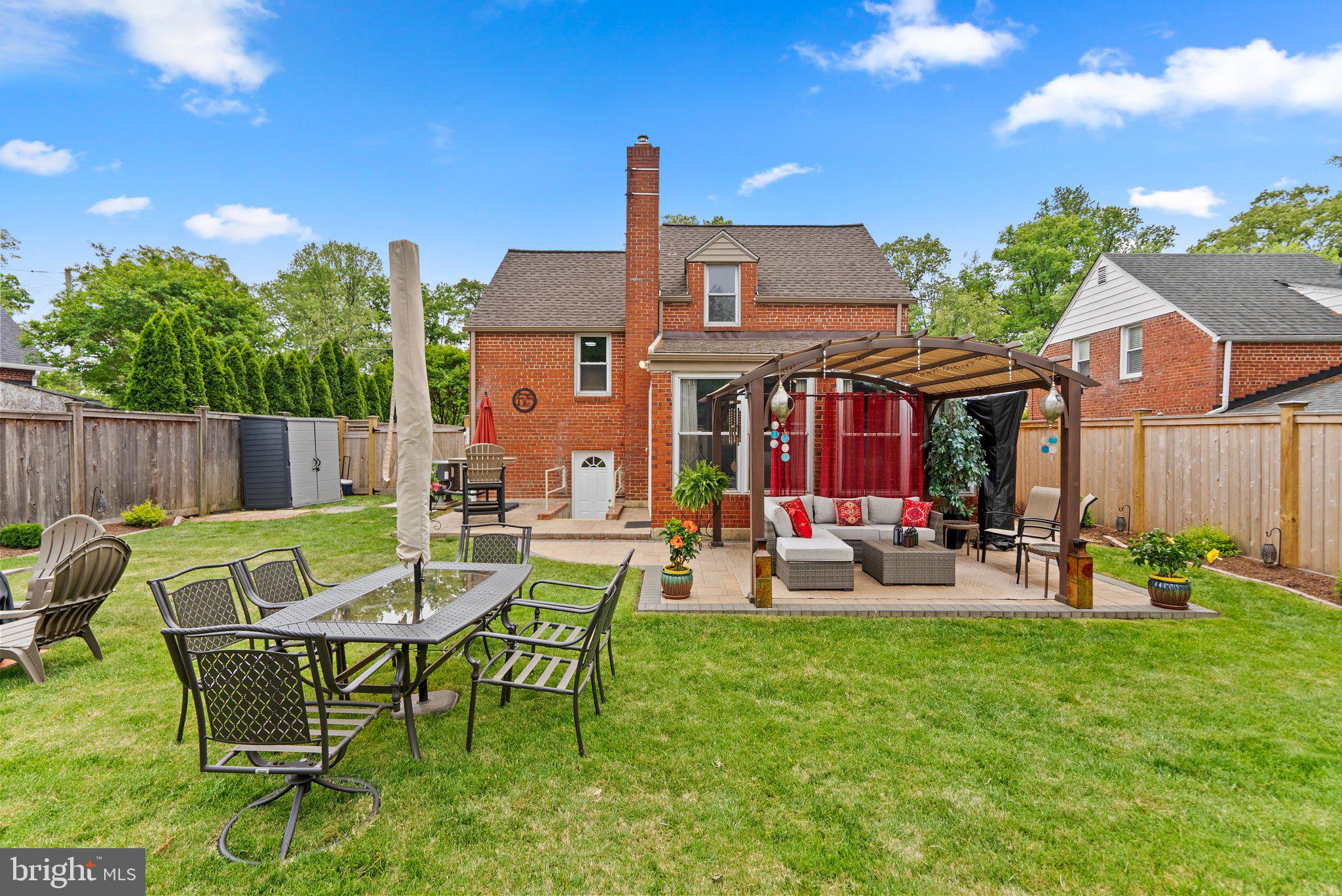 1013 Carson Street Silver Spring, MD 20901 - Photo 19 of 20 a view of a house with swimming pool and sitting area