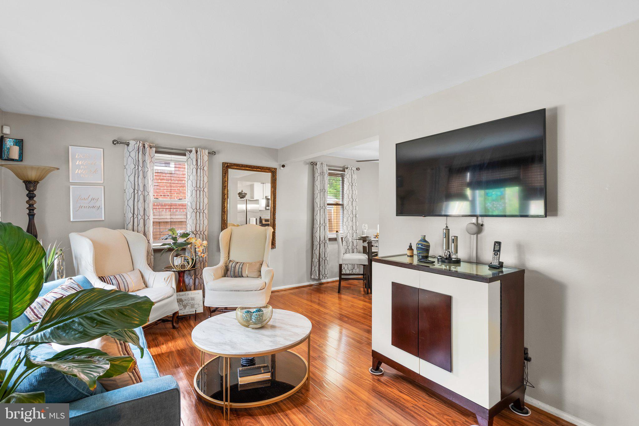 1013 Carson Street Silver Spring, MD 20901 - Photo 3 of 20 a living room with furniture and a wooden floor