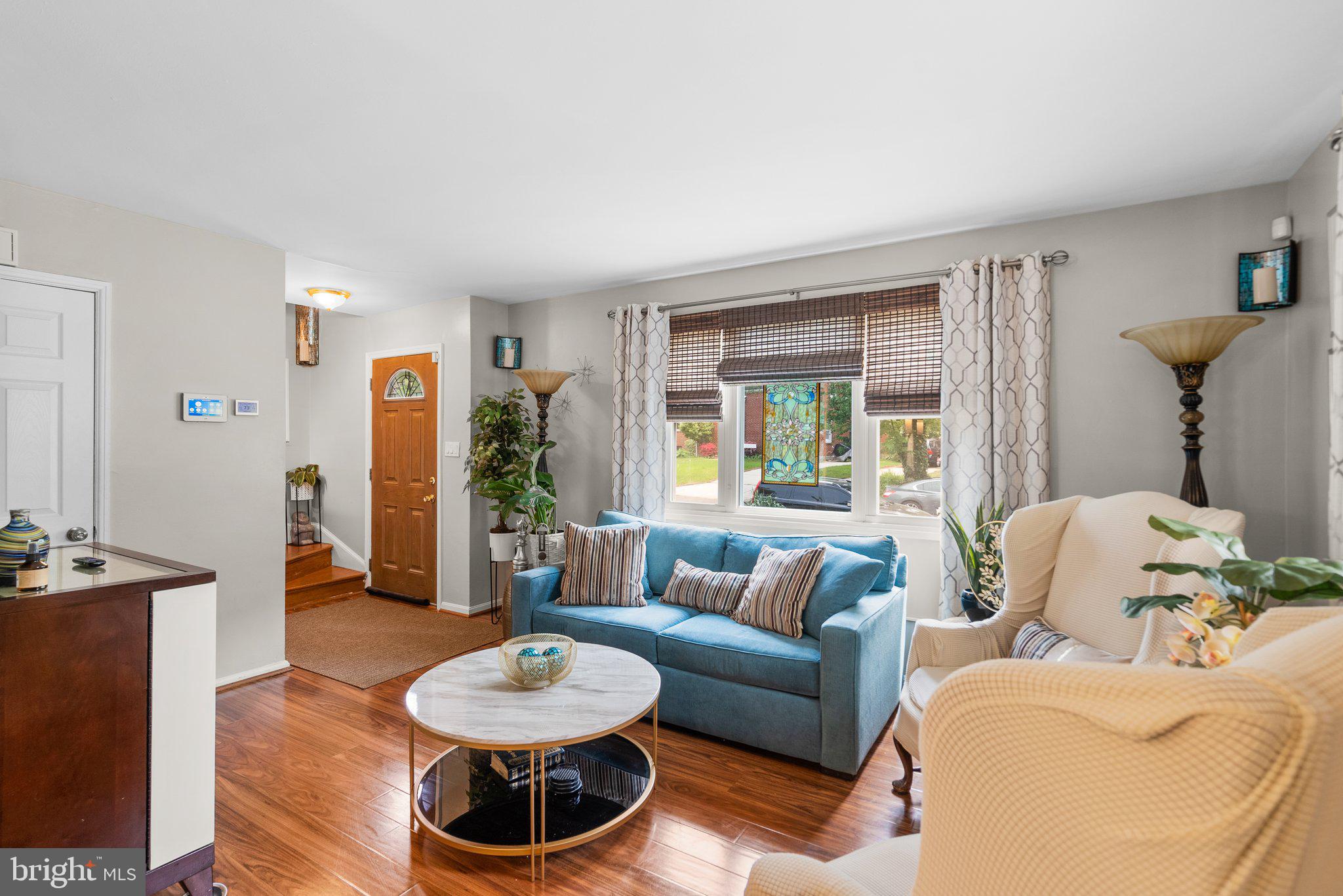 1013 Carson Street Silver Spring, MD 20901 - Photo 4 of 20 a living room with furniture and a wooden floor