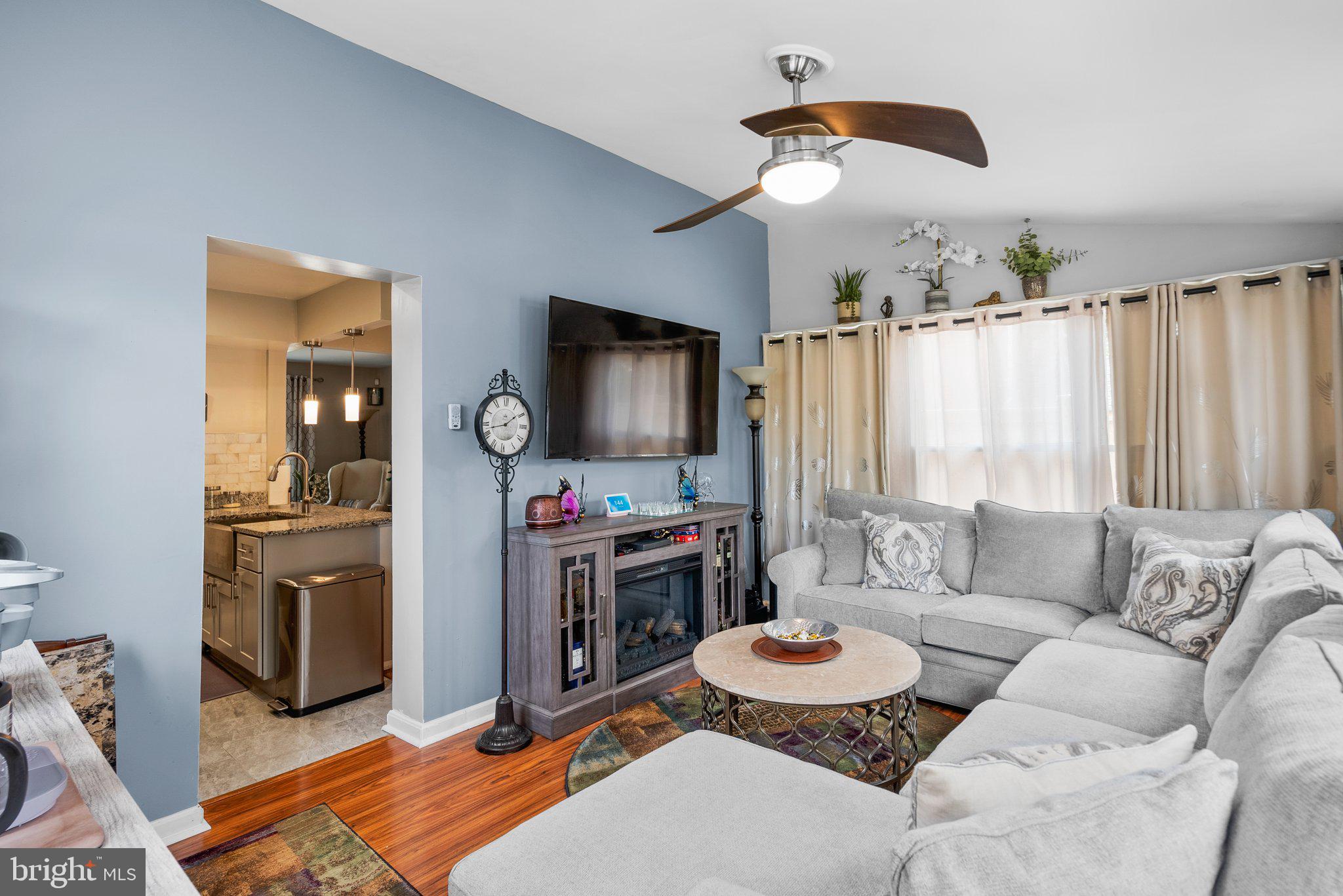 1013 Carson Street Silver Spring, MD 20901 - Photo 10 of 20 a living room with furniture and a flat screen tv