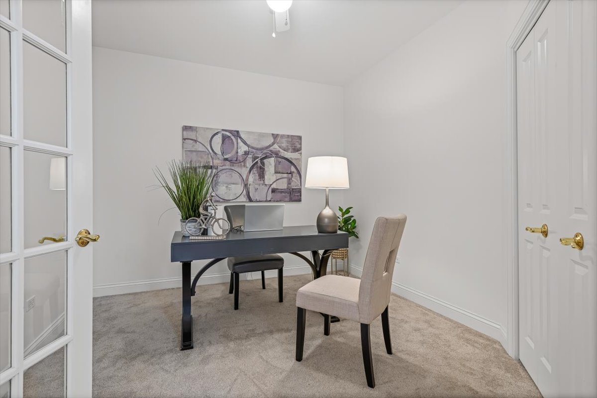 45 Prairie Park Drive, Unit 501 Wheeling, IL 60090 - Photo 12 of 30 a view of a dining room with furniture