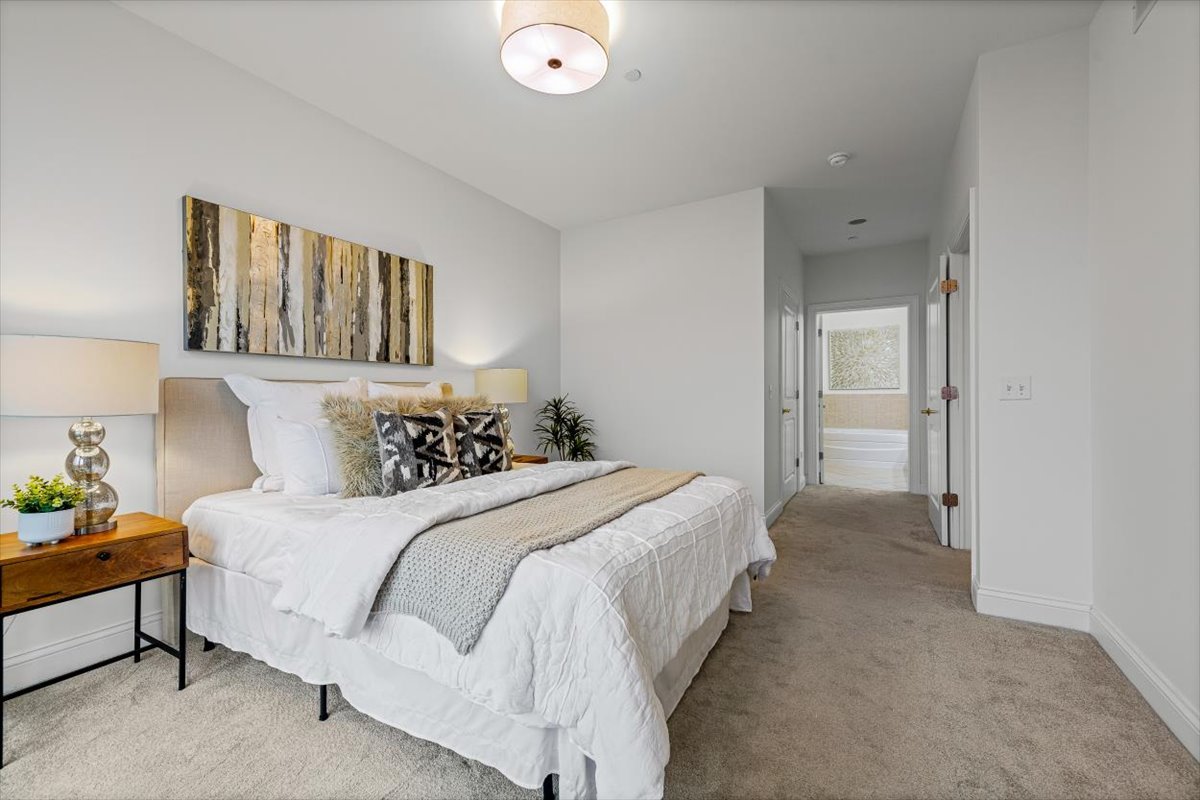 45 Prairie Park Drive, Unit 501 Wheeling, IL 60090 - Photo 14 of 30 a bedroom with a bed and window