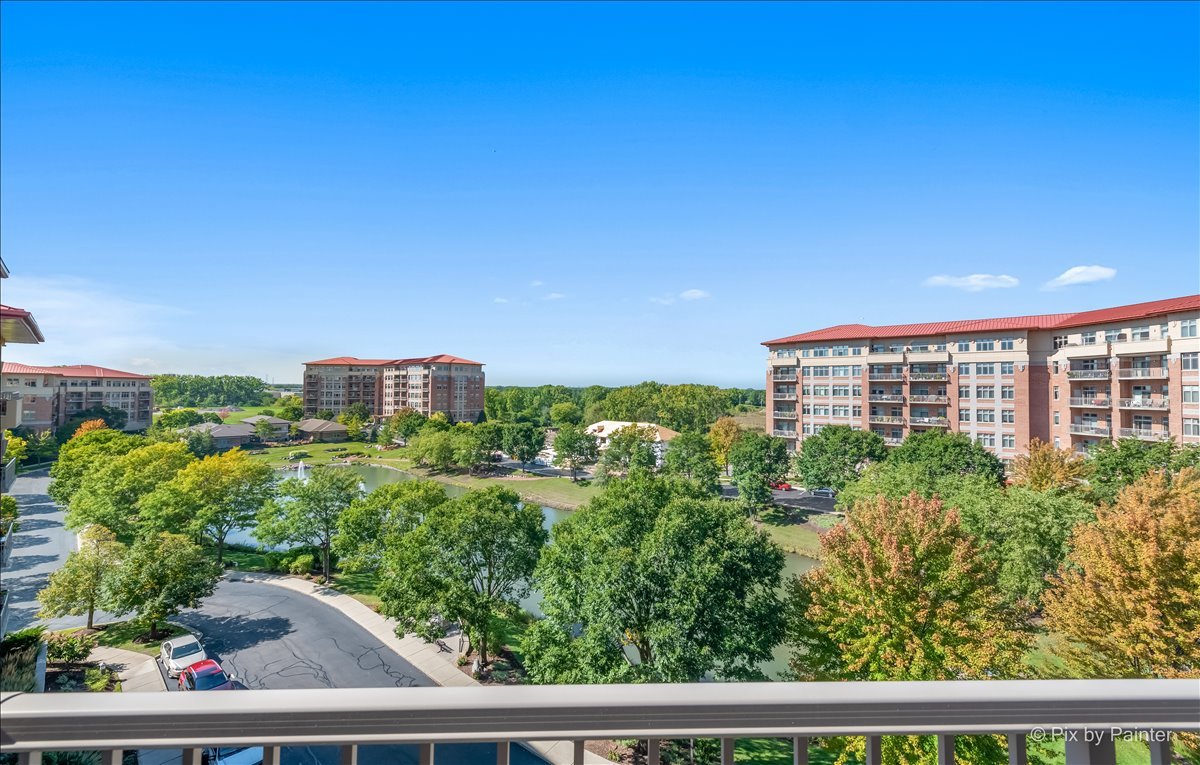 45 Prairie Park Drive, Unit 501 Wheeling, IL 60090 - Photo 21 of 30 a view of a balcony with an outdoor space