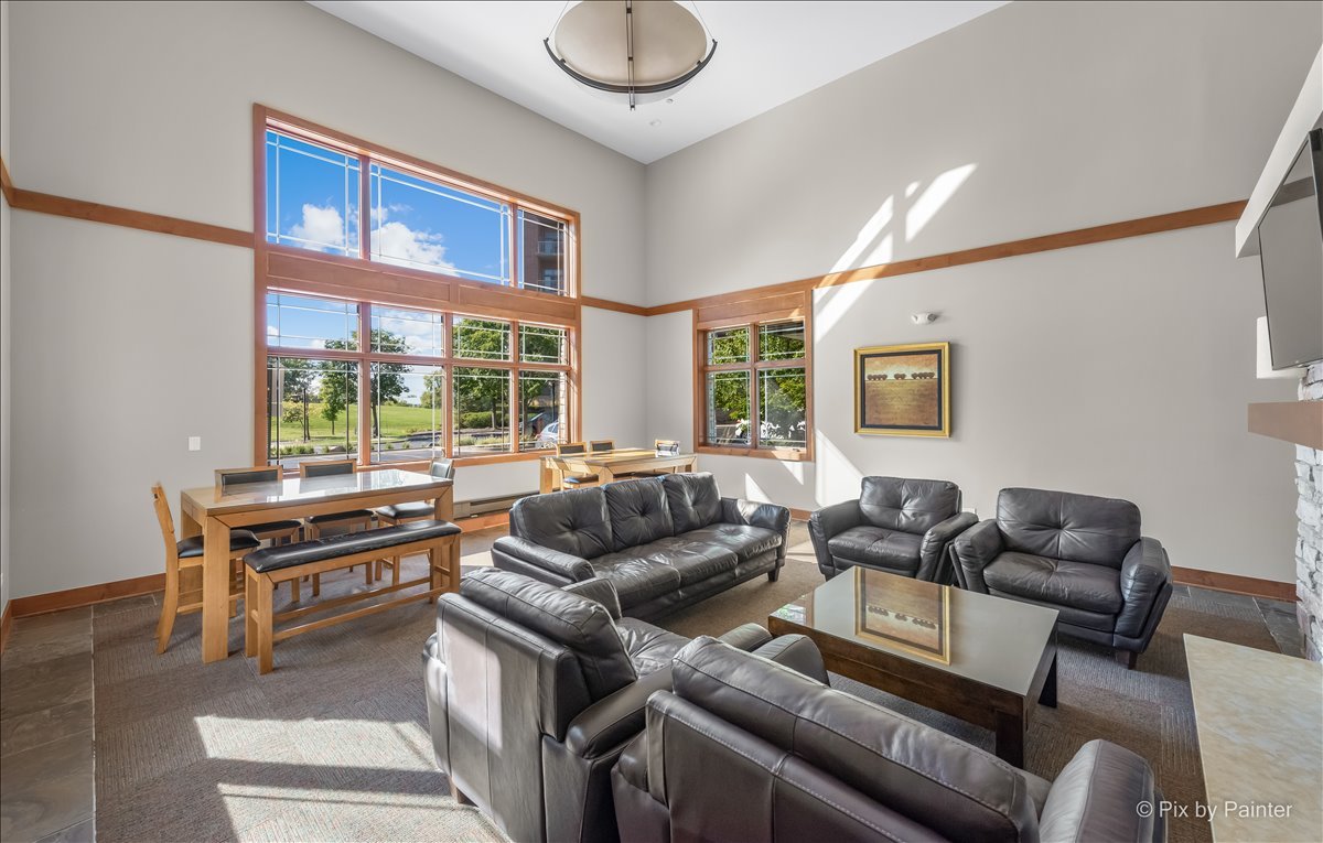 45 Prairie Park Drive, Unit 501 Wheeling, IL 60090 - Photo 25 of 30 a living room with furniture and a window